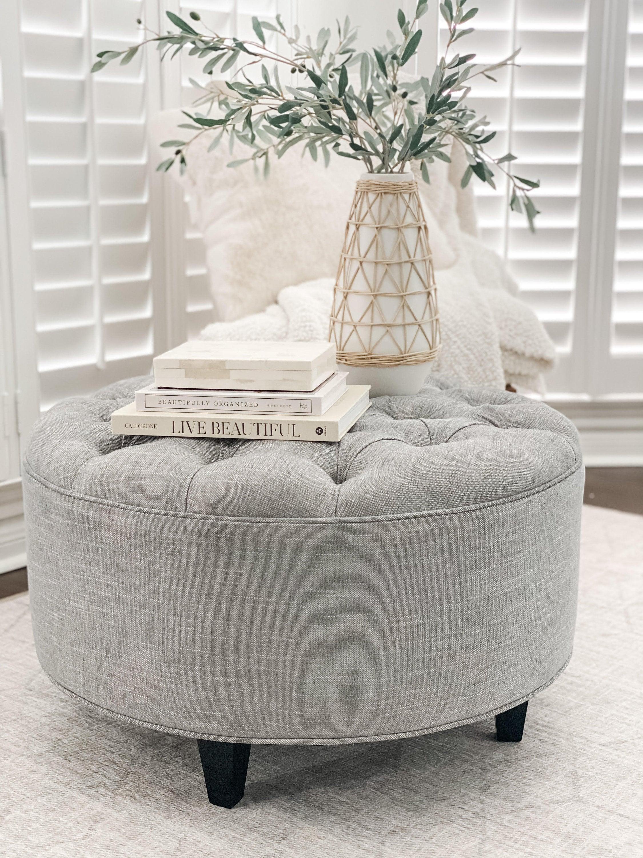 Grey tufted store ottoman